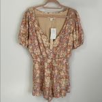 Saltwater Luxe  Puff Sleeve Floral Romper Photo 3