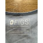 FIGS  Technical Collection Scrub Top Womens V Neck Blue Size x Small Pocket Nurse Photo 2