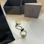 Calvin Klein NWT  Stainless Steel Silver Paw Print Fidget Spinner Ring Photo 3