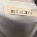 Miami Chic White Dress with Black Lace Detail Photo 1