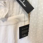 Lulus Lulu’s jumpsuit Clareese White Swiss dot ruffled long sleeve jumpsuit Medium NWT Photo 8