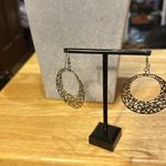 Pierced earrings with lattice work metal very artisan looking.​​ Photo 2