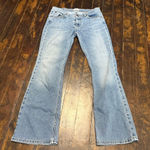American Eagle  Distressed flared 8 petite jeans Photo 0