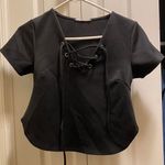 Likely Lively Black Lace Up Blouse Photo 0