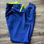 FIGS  Blue Joggers with Neon Yellow Accents women’s. Size Small
Style# M21SW2053 Photo 0