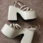 Dolls Kill white platform heels Photo 1