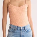 Elodie NWT V-Neck Textured thin strap snap body suit size medium light orange Photo 0