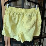 Free People FP Movement In The Wild Shorts butter Yellow pockets workout elastic Size M Photo 4