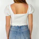 Grey Bandit White Top Photo 1