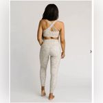 Zyia Bentonite Ruched Pocket Hi-rise 7/8 24" Leggings and Sports Bra Set. Photo 2