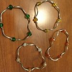 4 stretch silver twirl crystal bracelets Photo 3