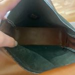 Stylish Green Suede Shoulder Bag with Purple and Gold Accents Photo 2