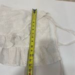 Princess Polly  White Eyelet Ruffle Wrap Mini Skirt | Size 0 Photo 5