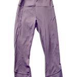Lululemon Lavender color cropped leggings, inner waistband pocket, excellent condition, size 4 Measurements: Waist: side to side 12-14 inches Inseam: 20 inches Photo 0