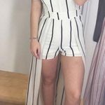 Marshalls black and white stripped Romper with train  Photo 0