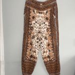 Anthropologie  Brown and Cream Floral Cropped Pants Photo 3