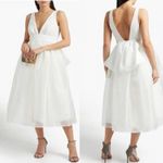 Sachin & Babi Carmina Bow Photo 1