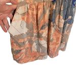 BCBGeneration  one shoulder pocket romper pastel floral size 2 side zipper Photo 1