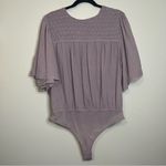 Free People  Lavender Smocked Embroidered Bodysuit Size L‎ Boho Flutter Sleeve Photo 4