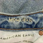 American Eagle ⭐️  light wash distressed mom jeans in size 4 Photo 5