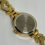 Women’s quartz analog gold tone wrist watch 23mm case white dial 7” Photo 4