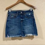 American Eagle Outfitters lightly distressed medium blue high rise mini skirt Photo 0