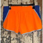 Nike  Women’s Dri Fit Running Shorts, size XL orange blue Photo 2