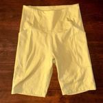 Girlfriend Collective  Saddle Pocket Biker Shorts Green/Yellow Photo 0