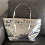 Kate Spade  silver mirror finish huge tote w bow storybook lining Photo 0