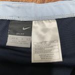 Nike  Womens Solid Navy Blue Dri-Fit Tennis Skirt Size Medium Yellow Swoosh Check Photo 3