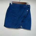Free People We The Free Denim Mini Skirt. Asymmetrical button snaps. Size 6 Photo 1