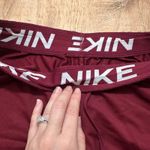 Nike | Dri-FIT Women's Burgundy Athletic Workout Gym Running Shorts Photo 2