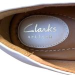 Clarks EUC Leather Hidden Low Wedge Flats White Silver Size 7 Photo 3
