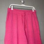 Nike  Yoga Luxe 7/8 Fleece Jogger Pants in Pink Women’s Size Large Athletic Pants Photo 3