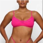 SKIMS  fits everyone scoop bralette Neon Rose NWOT size XS Photo 1