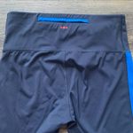 Saucony  Dark Blue Leggings with Blue Stripe S Photo 7