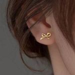Gold Bow Dainty Earrings Photo 0