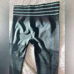 Fabletics  teal/turquoise and dark gray mid rise athletic leggings, size Medium Photo 7