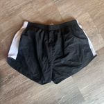 None Black and white athletic running shorts Photo 3