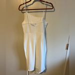 NWT Asymmetrical White Dress with Slit Size Medium Photo 3