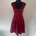 Boohoo  Maroon sleeveless mini dress with skater skirt and deep v neck Photo 1