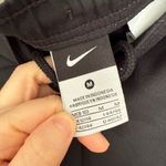 Nike  Women’s Medium Black White Cropped Pants Photo 2