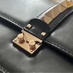 Valentino Garavani Valentino Rockstud Medium Glam Lock Flap Bag in Black Photo 11