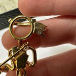 Signed KKIED Gold Tone Brooch Pin Athlete / Lady Running Hinged Swinging Legs Photo 5