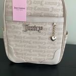 Juicy Couture  Beige Backpack with Heart Charm Photo 0