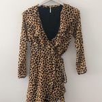 Free People  Leopard Print Ruffle Plunge Neckline Long Sleeve Wrap Dress Photo 1