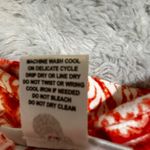 Rebecca Malone Orange and White Patterned Blouse Photo 7