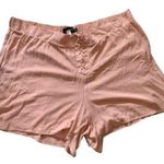Torrid | pink crepe lace front shorts Photo 0