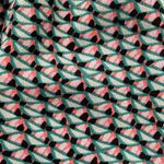 BCBGMAXAZRIA 2 pocket pant in sea green and coral print with black side stripe Photo 5