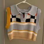 Cider Sweater Vest Photo 0